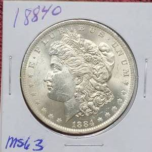 lot 31 image: 1884-O Morgan Silver Dollar, Higher Grade