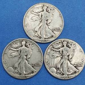 lot 77 image: (3) 1942 Walking Liberty Half Dollars 90% Silver