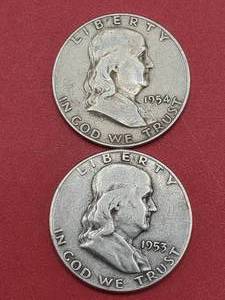 lot 82 image: 2 Franklin Half Dollars 90% Silver