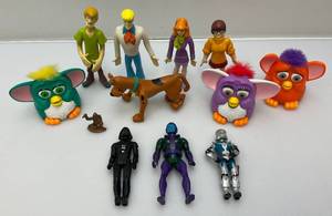 lot 58 image: Vintage Action Figures Including Furbys, Star Wars, G I Joe, Scooby Doo