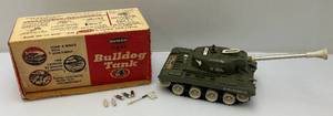 lot 69 image: 1960s REMCO Battery Operated Miniature 13  US Army Bulldog Tank In Original Box With Projectiles