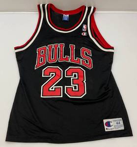 lot 87 image: Vintage Jordan 23 Champion Authentic Athletic Apparrel Basketball Jersey Size 44
