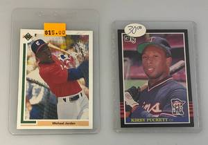 lot 200 image: 1984 Donruss Kirby Pucket Rookie Card And Michael Jordon Baseball Card (Both In Protective Sleeves)