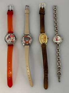 lot 45 image: Three Collectible Vintage Womens Cartoon Character Watches Including Betty Boop, Minnie Mouse & Pooh