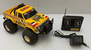 lot 239 image: 1870s-80s Radio Shack RC 4X4 Pick Up Truck With Remote And Charger (One Flat  Spot On Rear Passenger Side Tire) Can Be Fixed
