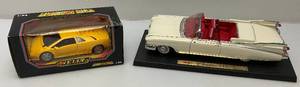 lot 16 image: (RELISTED DO TO NO SHOW) Misc. Die Cast Cars In 124 Scale Including Welly Lamborghini Diablo And Maisto Special Edition Cadillac Eldorado Biarritz 118 Scale