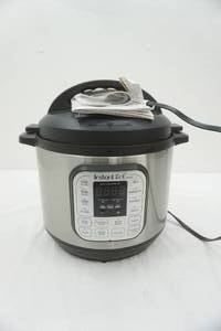 lot 153 image: Instant Pot 8 Quart Electric Pressure Cooker