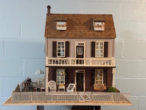 lot 43 image: Fully Furnished Dollhouse with Accessories and Extra Miniatures