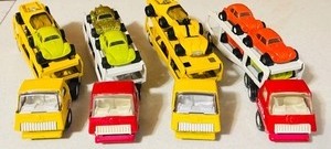 lot 85 image: Collection of Vintage Tonka Toy Car Haulers with Die-Cast Cars