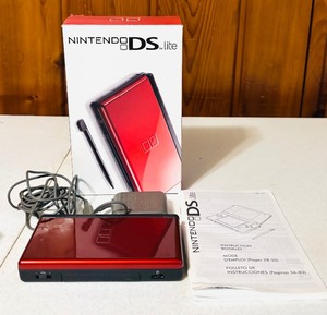 lot 84 image: Nintendo DS Light with Two Stylists and Games