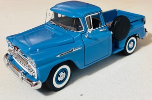lot 82 image: 1958 Chevrolet Apache Fleet Side Pickup Truck in Light Blue by Motormax Manufacture