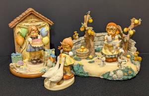 lot 23 image: Three Little Girl Hummel Figurines