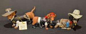 lot 53 image: Spurs N Fur Dachshund Figurines