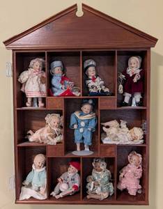 lot 60 image: Ashton-Drake Set 11 Porcelain Picture Perfect Mini Dolls with Display Case