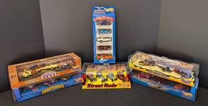 lot 127 image: Assorted Hot Wheels Multi Pack Car Sets