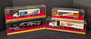 lot 134 image: Four Beverage Diecast Semi Trucks and Cases
