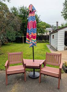 lot 1 image: Wood Composite Double Patio Chair Combo
