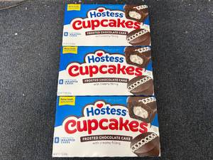 lot 221 image: 3 Packs of Hostess Cupcakes