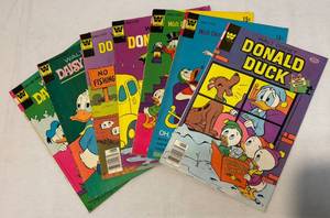 lot 136 image: Seven Donald Duck Comic Books