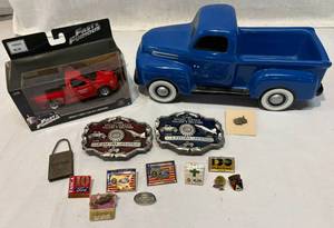 lot 181 image: Collection of Ford Pins, UAW Belt Buckles, Ford Trucks