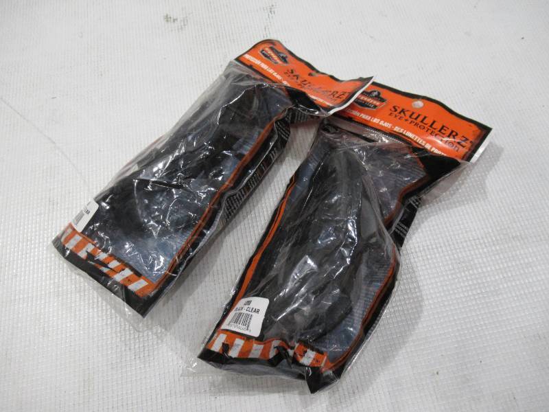 lot 724 image: NEW 2 Pack of Ergodyne Skullerz LOKI Convertible Safety Spoggles w Strap -Black-Clear Lens