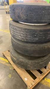 lot 317 image: Set of 4 Used Goodyear Commercial Truck Tires with Rusted Steel Rims