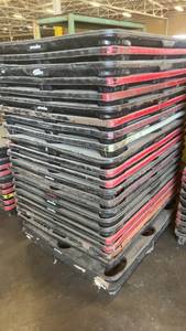 lot 476 image: Stack of Plastic Nestable Pallets with Red Edges