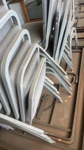 lot 498 image: Stack of 8 Metal Frame Upholstered Chairs and 2 Folding Tables
