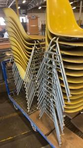 lot 691 image: Lot of Stacking Yellow Plastic Chairs with Metal Legs on Rolling Cart