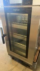 lot 713 image: Alto-Shaam VMC-H4H Commercial Electric Oven with Stainless Table