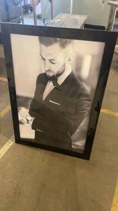 lot 731 image: Framed Black and White Portrait Photograph of Man in Suit