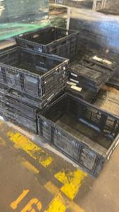 lot 747 image: Stack of Black Plastic Crates for Storage or Transport