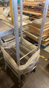 lot 809 image: Commercial Rolling Sheet Pan Rack with Multiple Wire Shelves