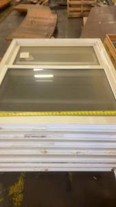 lot 825 image: Stack of Used Double Hung Windows 55in x 45in