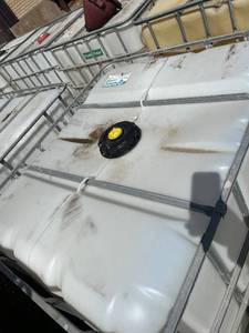 lot 1204 image: Used 275 Gallon IBC Tote Water Storage Tank