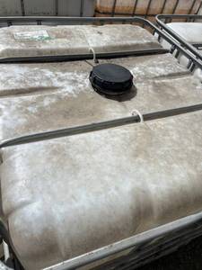 lot 1407 image: Used 275-Gallon IBC Tote Tank with Metal Cage