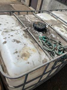 lot 1509 image: Large Plastic IBC Tote Storage Container with Metal Cage