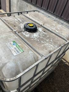 lot 1510 image: Used IBC Tote Tank with Metal Cage, Approx. 275 Gallon Capacity