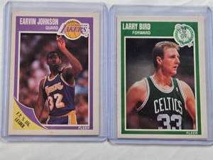 lot 214 image: Lot of 2 1989 Fleer Basketball Cards Earvin Johnson #77 and Larry Bird #8
