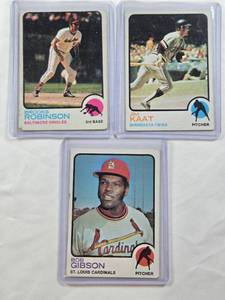 lot 233 image: Lot of 3 Vintage 1973 Topps Baseball Cards Featuring Jim Kaat #530, Brooks Robinson #90, and Bob Gibson #190