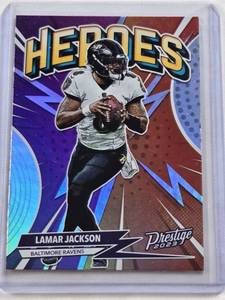 lot 289 image: Lamar Jackson 2023 Panini Prestige Heroes Foil Insert #H-5 - Baltimore Ravens Football Card