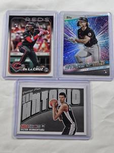 lot 300 image: Lot of 3 Stars Rookie Cards Jackson Holliday, Elly De La Cruz, and Victor Wembanyama