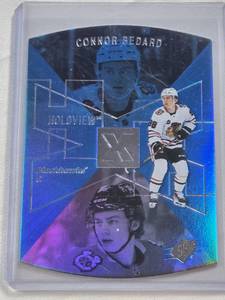 lot 301 image: Connor Bedard Rookie 2023-24 Upper Deck SPX Blue Foil Die Cut #SPX33 - Chicago Blackhawks Hockey Card