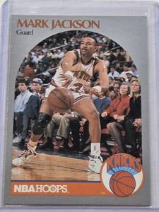 lot 355 image: Mark Jackson 1990 NBA Hoops #205 with Menendez Brothers in the Background - New York Knicks Basketball Card