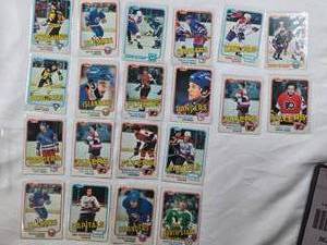 lot 362 image: Lot of 18 1981-82 Vintage Hockey Cards Featuring Players Like Paul Gardner, Ken Morrow, and Butch Goring