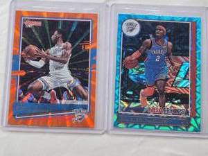 lot 417 image: Lot of 2 Shai Gilgeous-Alexander Basketball Cards Including Donruss and NBA Hoops Foil SP Cards