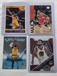 lot 425 image: Lot of 4 NBA Goat Basketball Cards Featuring Michael Jordan, Stephen Curry, Kobe Bryant, and LeBron James