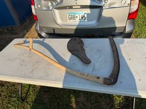lot 14 image: SICKLE SYTHE AND METAL SEAT