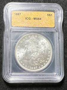lot 19 image: 1887 US MORGAN SILVER DOLLAR ICG MS64