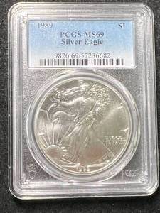 lot 30 image: 1989 AMERICAN SILVER EAGLE PCGS MS69